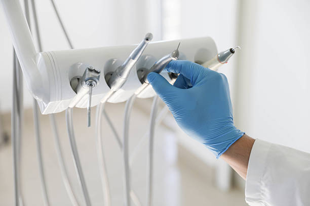 Professional Tooth Extraction technician working in East Flat Rock, NC